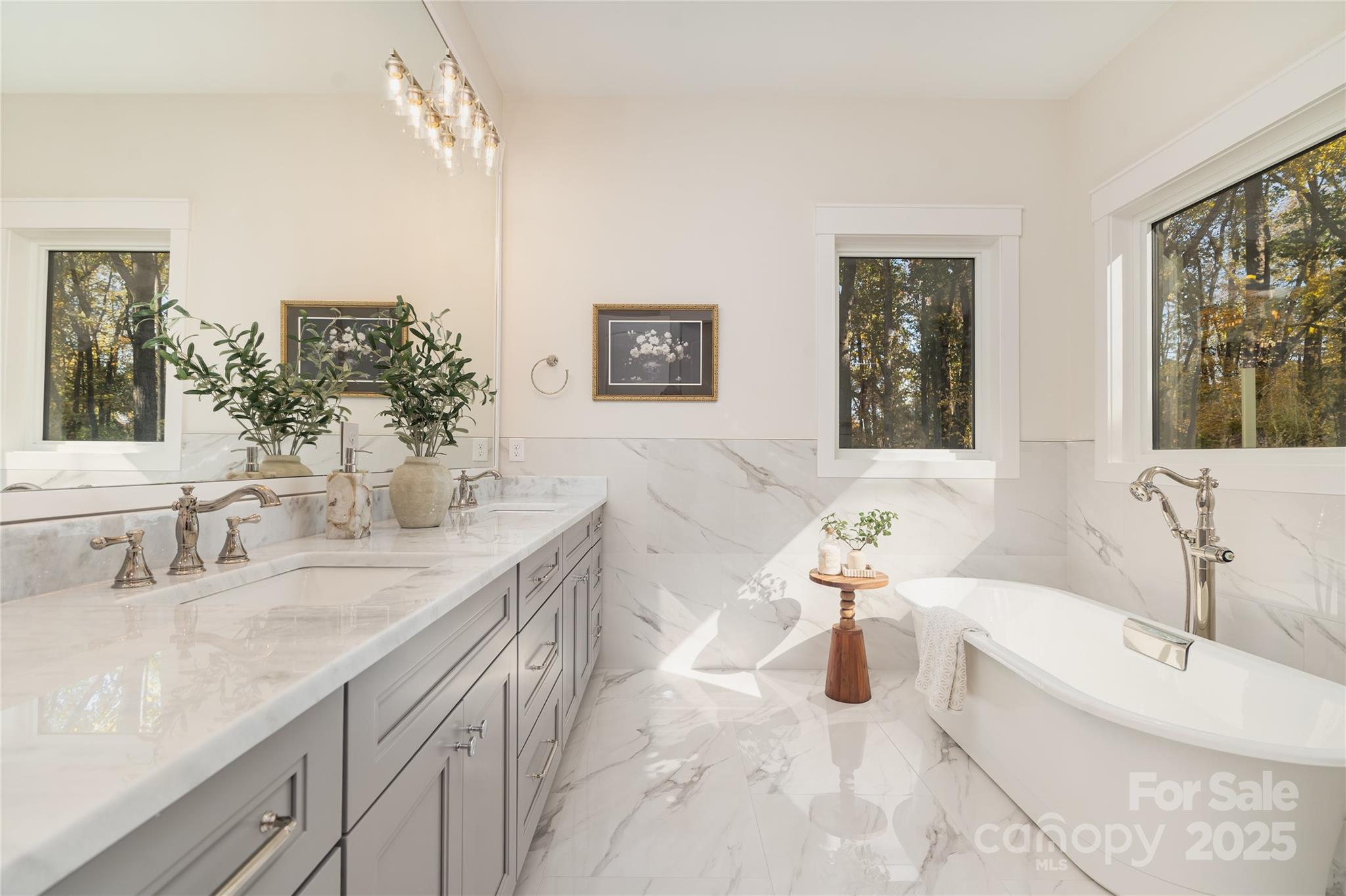 6632 Silver Fox Road Charlotte, NC 28270 - Photo 13 of 42 a bathroom with a granite countertop sink a toilet a mirror and shower