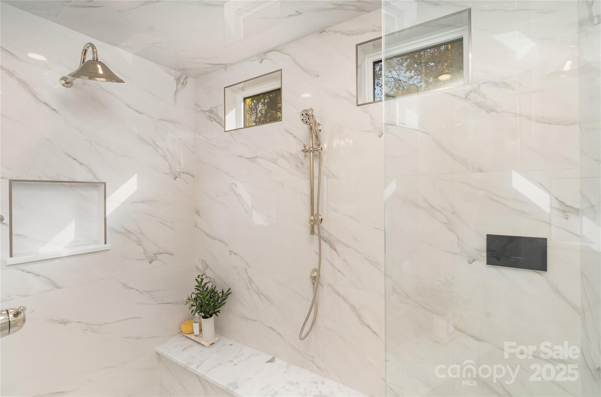 6632 Silver Fox Road Charlotte, NC 28270 - Photo 14 of 42 a white bath tub sitting next to a white wall
