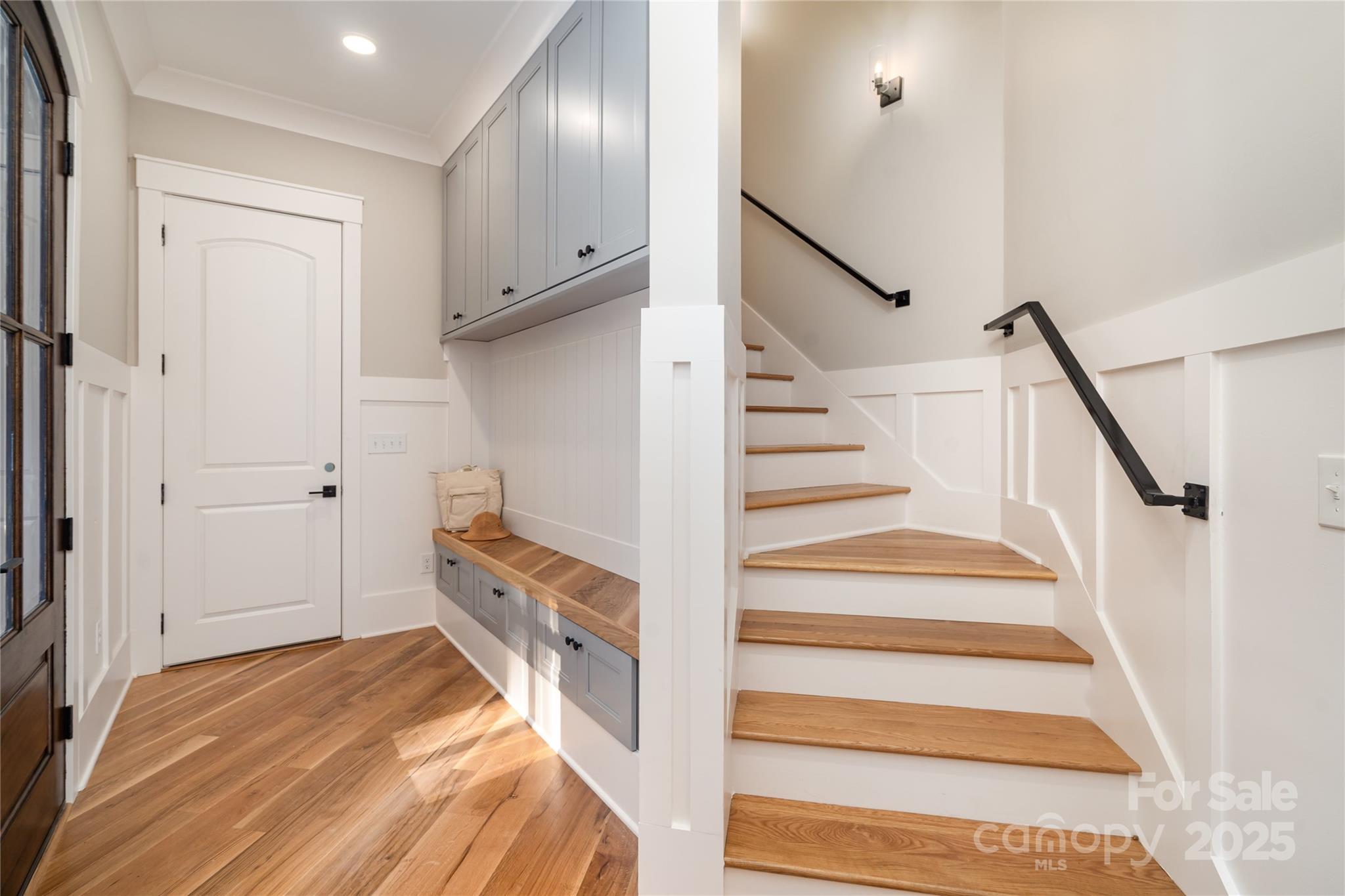 6632 Silver Fox Road Charlotte, NC 28270 - Photo 23 of 42 a view of hallway with stairs and wooden floor