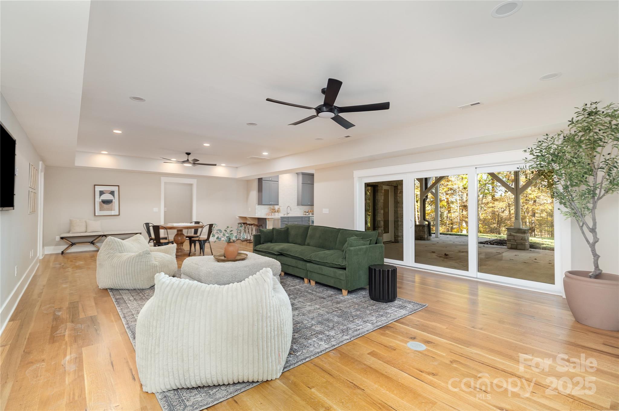 6632 Silver Fox Road Charlotte, NC 28270 - Photo 28 of 42 a living room with furniture and a large window