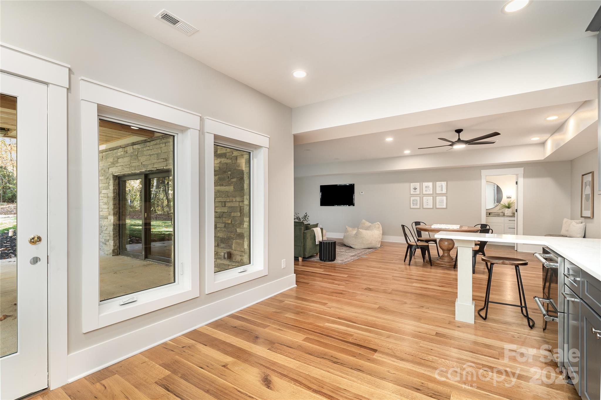 6632 Silver Fox Road Charlotte, NC 28270 - Photo 30 of 42 a view of a dining hall with furniture and window