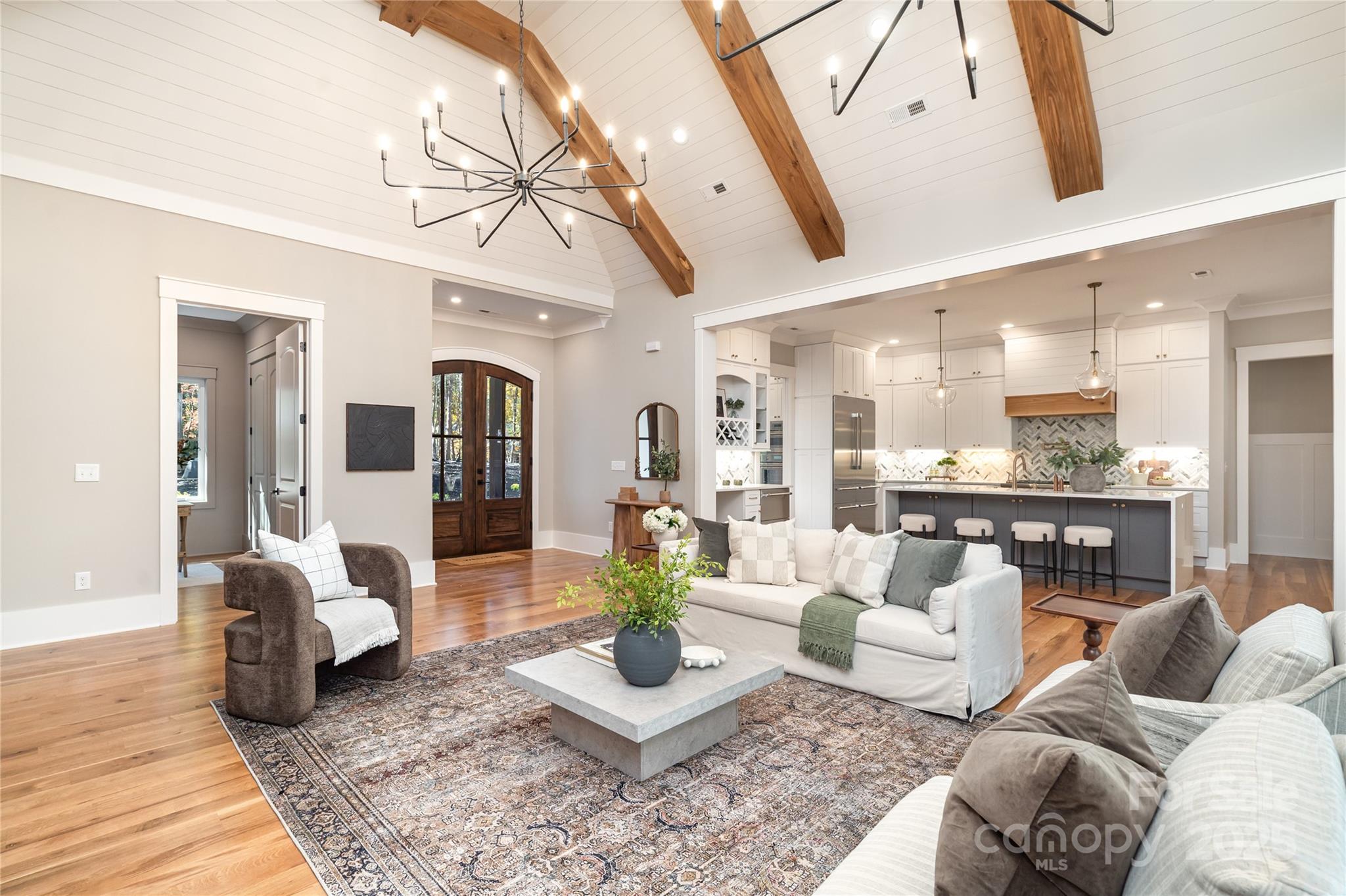 6632 Silver Fox Road Charlotte, NC 28270 - Photo 4 of 42 a living room with furniture and wooden floor
