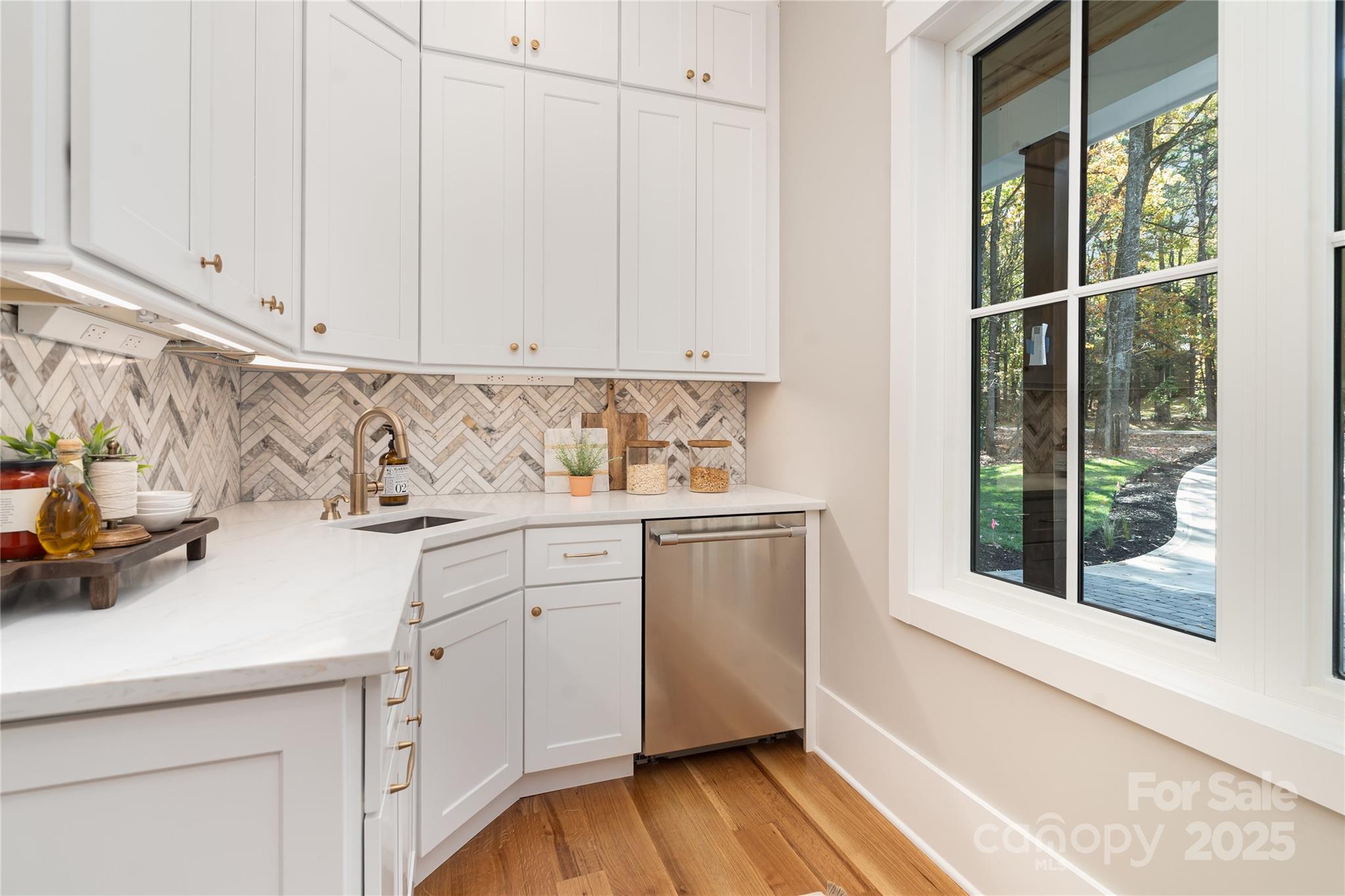 6632 Silver Fox Road Charlotte, NC 28270 - Photo 8 of 42 a view of cabinets with wooden floor
