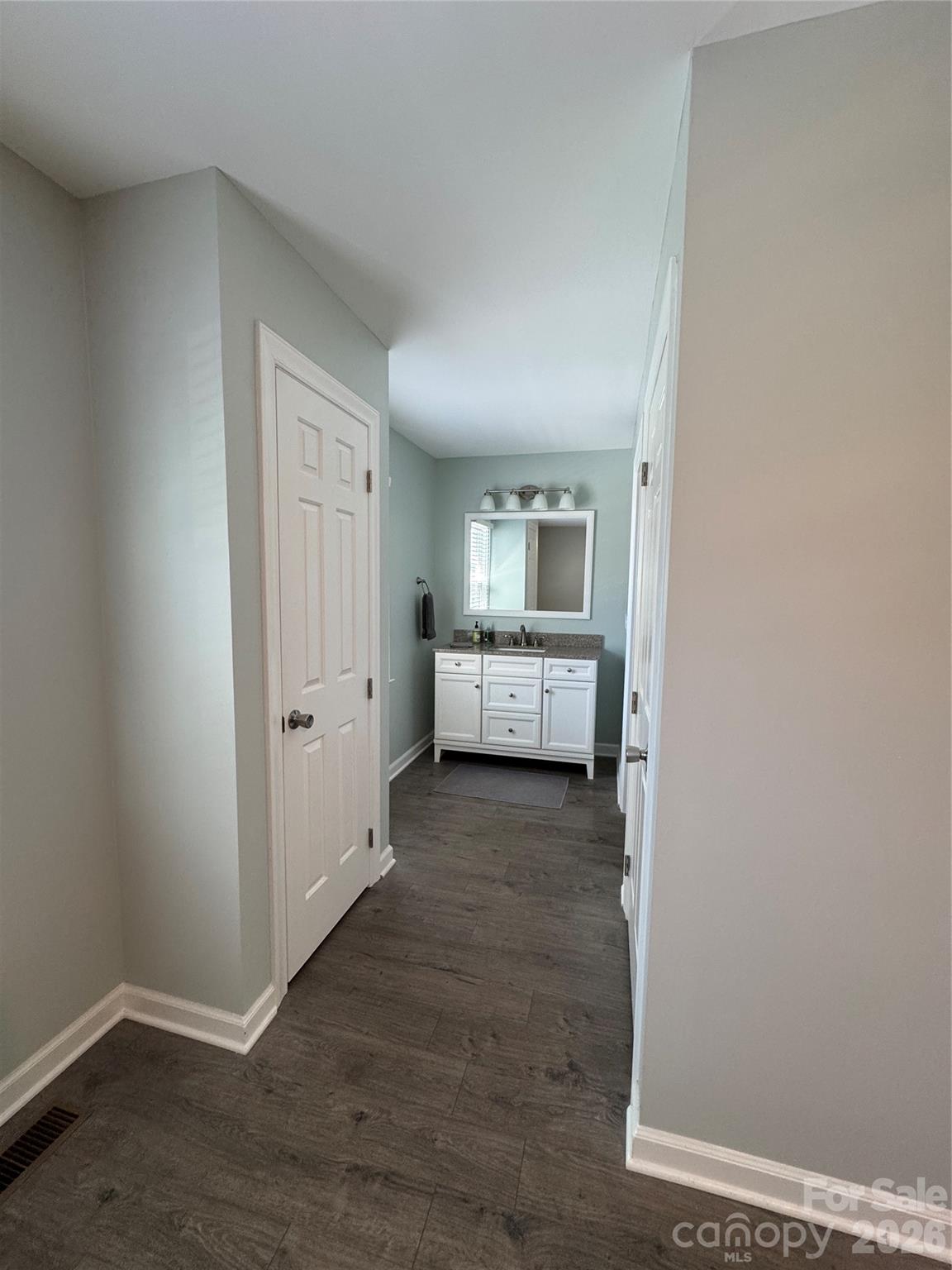 2705 North Center Street, Unit 36 Hickory, NC 28601 - Photo 12 of 21 a view of a room with wooden floor cabinet and a living room