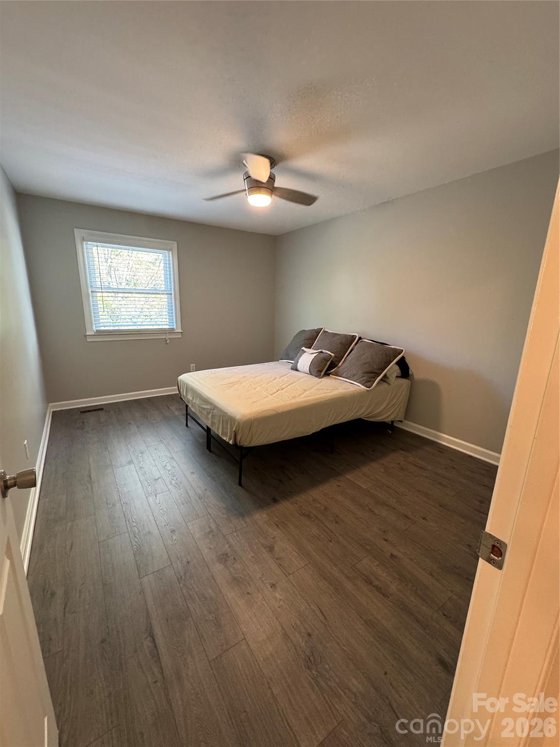 2705 North Center Street, Unit 36 Hickory, NC 28601 - Photo 13 of 21 a bedroom with a bed and window