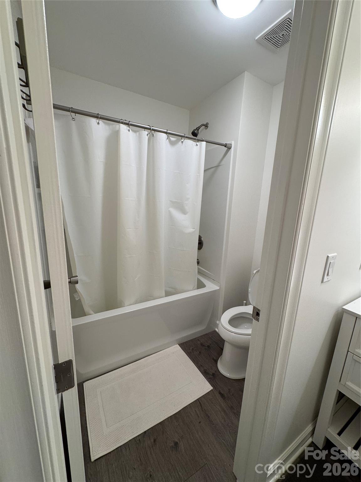 2705 North Center Street, Unit 36 Hickory, NC 28601 - Photo 15 of 21 a bathroom with a toilet and a shower