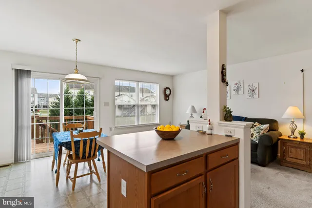 a bedroom with a bed and a lamp on table