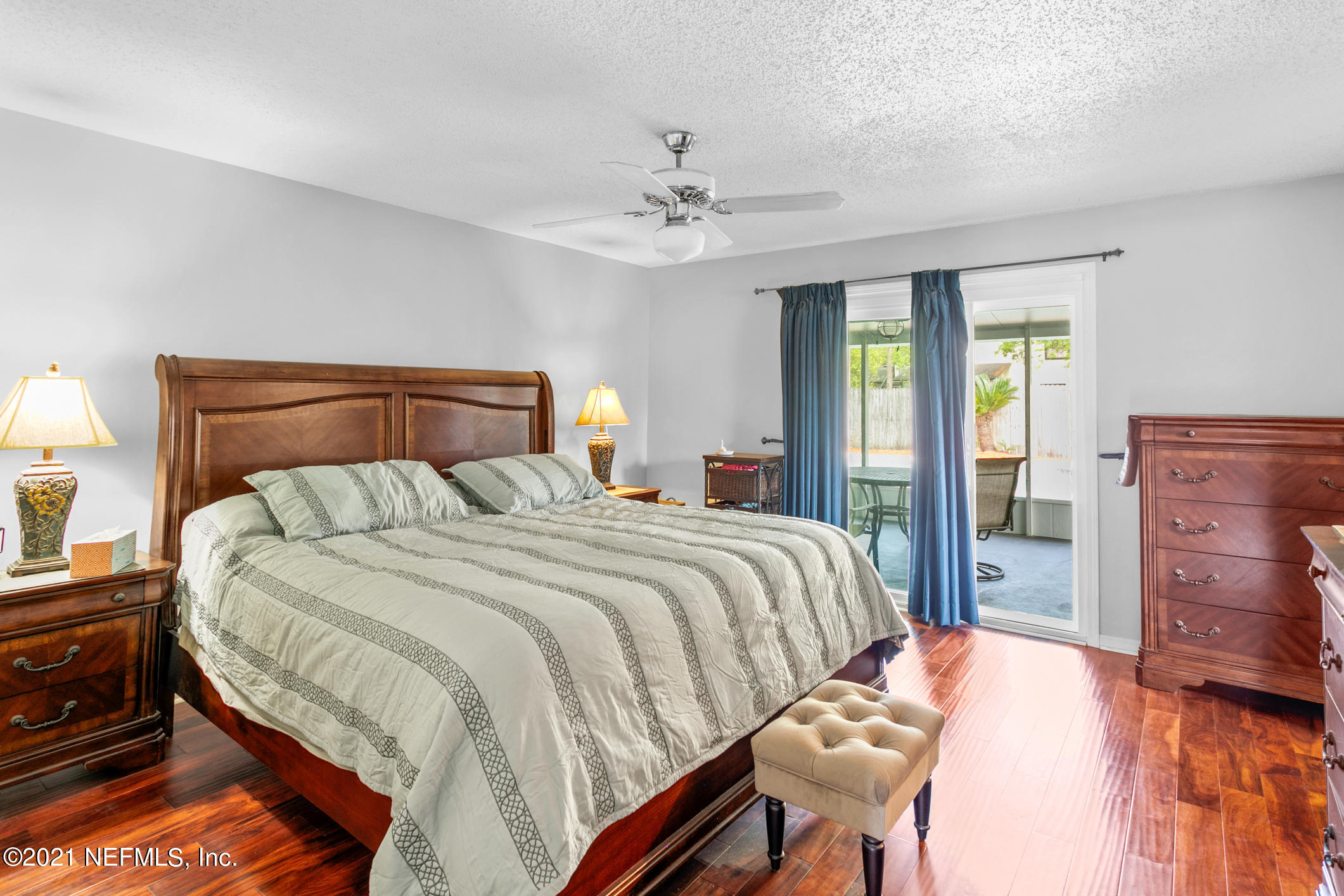 10841 Reading Road Jacksonville, FL 32257 - Photo 13 of 25 a bedroom with a bed and a dresser