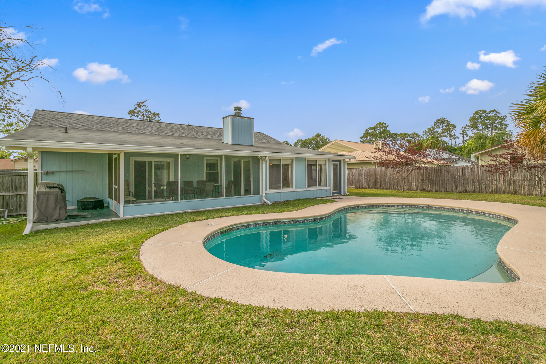 10841 Reading Road Jacksonville, FL 32257 - Photo 23 of 25 a view of a house with swimming pool