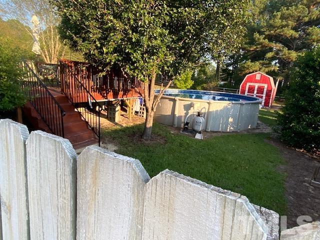 435 Ridge Road Angier, NC 27501 - Photo 13 of 29 Great view from left yard looking towards backyard.