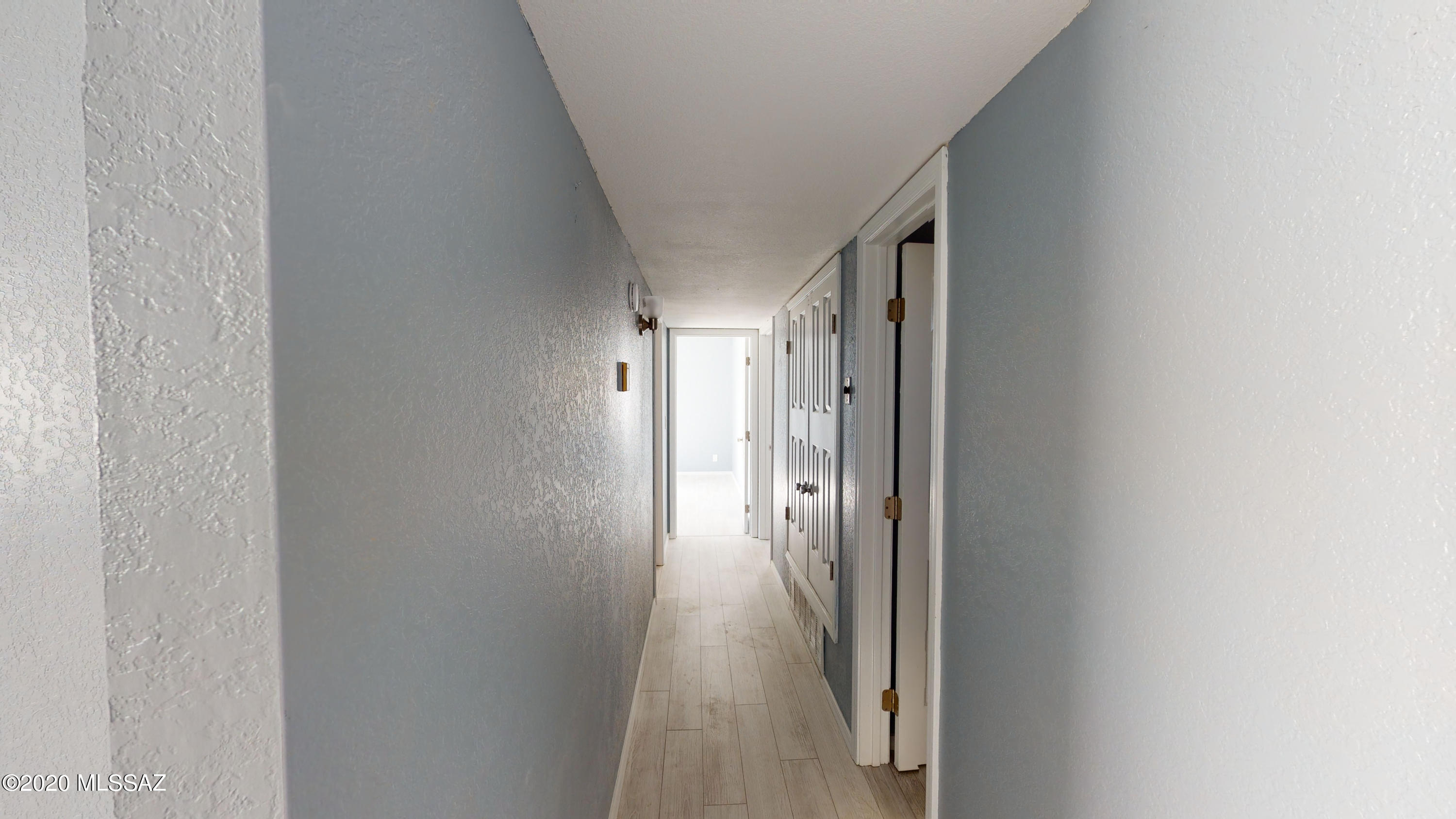 1034 Zorrita Court, Unit CORTE Rio Rico, AZ 85648 - Photo 6 of 16 a view of hallway with stairs