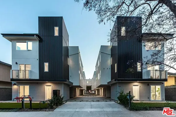 a front view of multiple houses