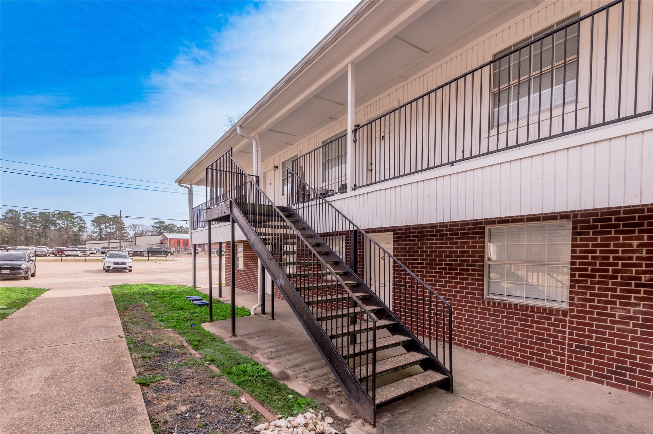 600 Palm Street, Unit 16 Huntsville, TX 77340 - Photo 2 of 21 a view of a backyard with a deck