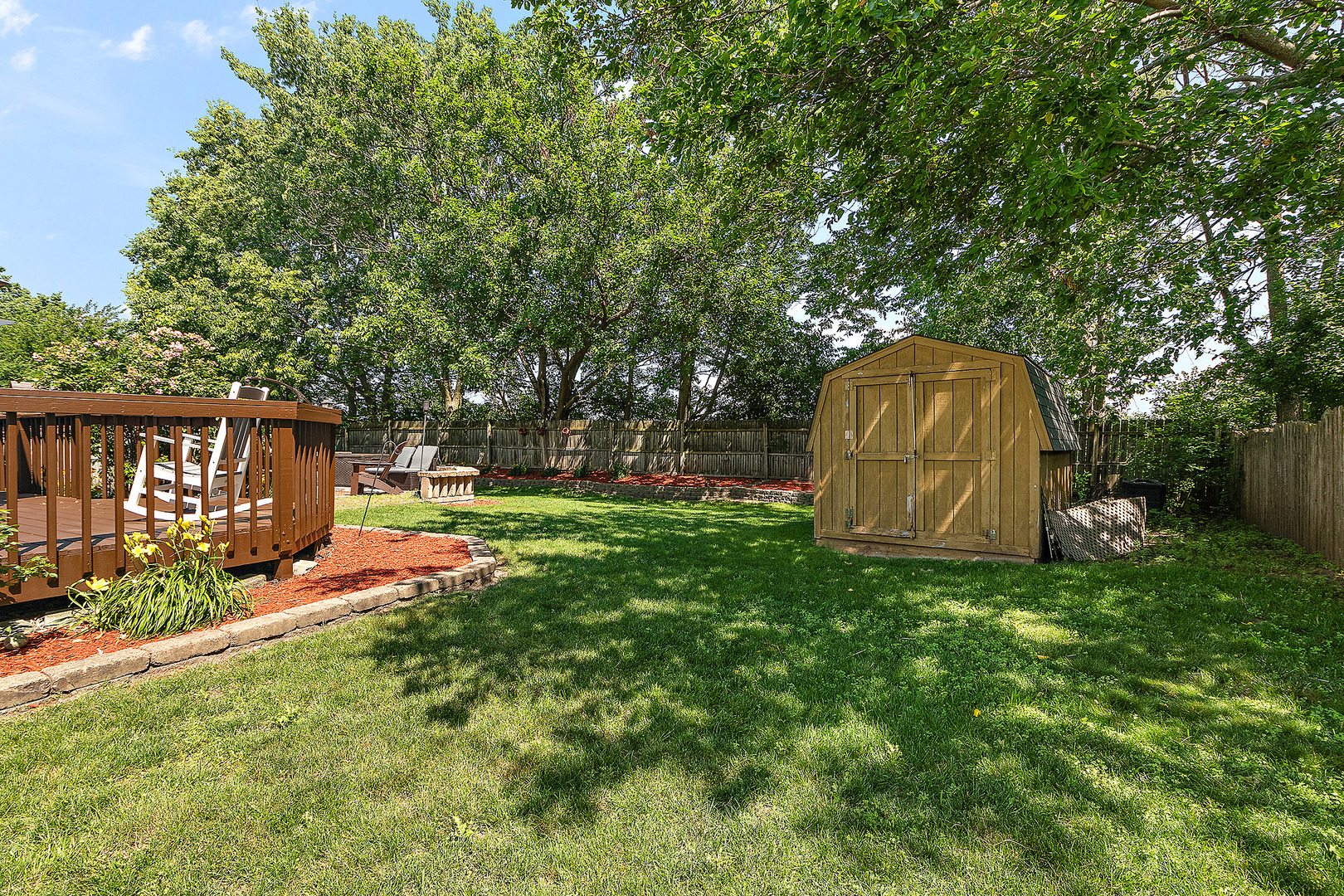 24929 Vermette Road Plainfield, IL 60585 - Photo 26 of 31 a view of a garden with a slide
