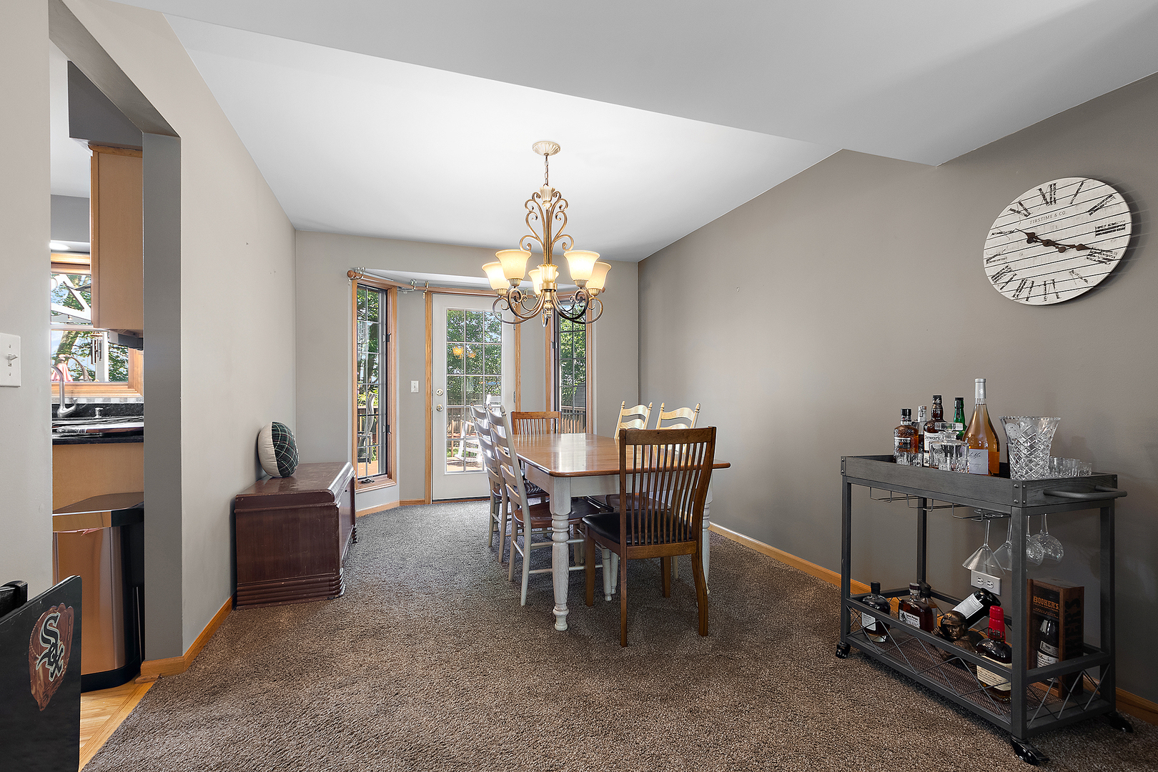 24929 Vermette Road Plainfield, IL 60585 - Photo 5 of 31 a view of a dining room with furniture and chandelier