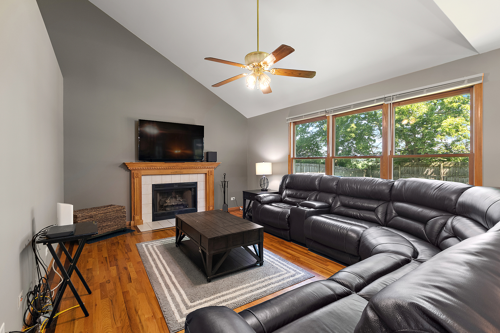 24929 Vermette Road Plainfield, IL 60585 - Photo 10 of 31 a living room with furniture fireplace and a large window