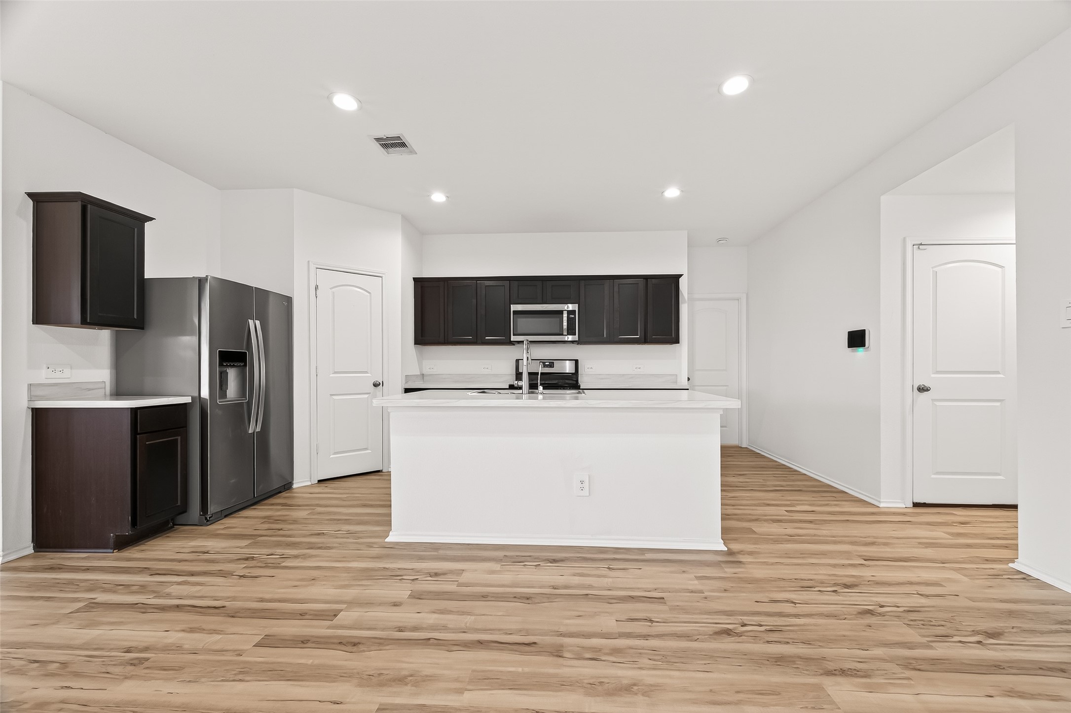 21522 Violet Ridge Road Katy, TX 77449 - Photo 11 of 39 Enjoy spacious legroom for bar stools, with a little coffee, and conversation at your inviting counter bar.