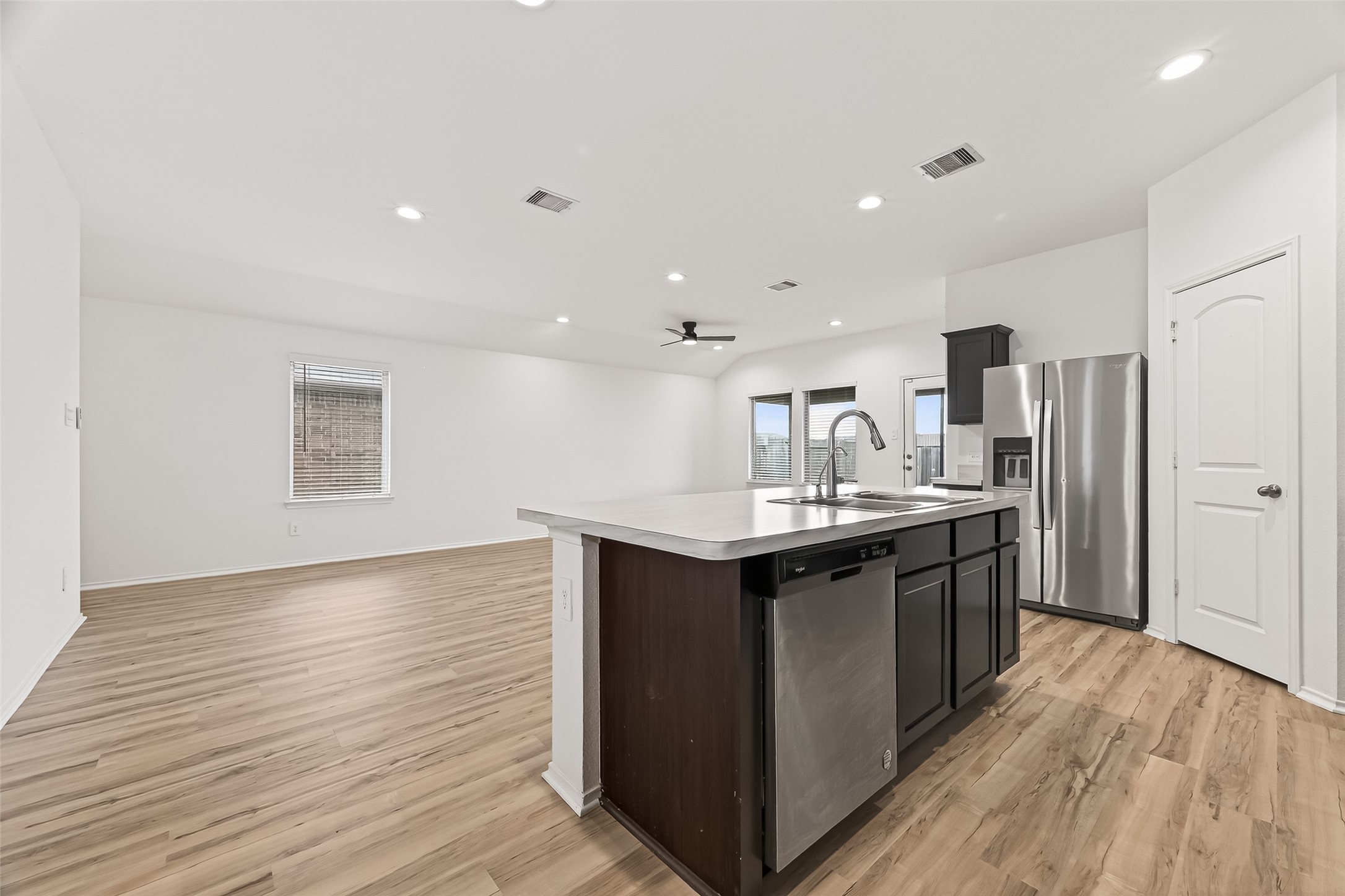 21522 Violet Ridge Road Katy, TX 77449 - Photo 13 of 39 Enjoy cooking in your bright, open kitchen with plenty of natural light.