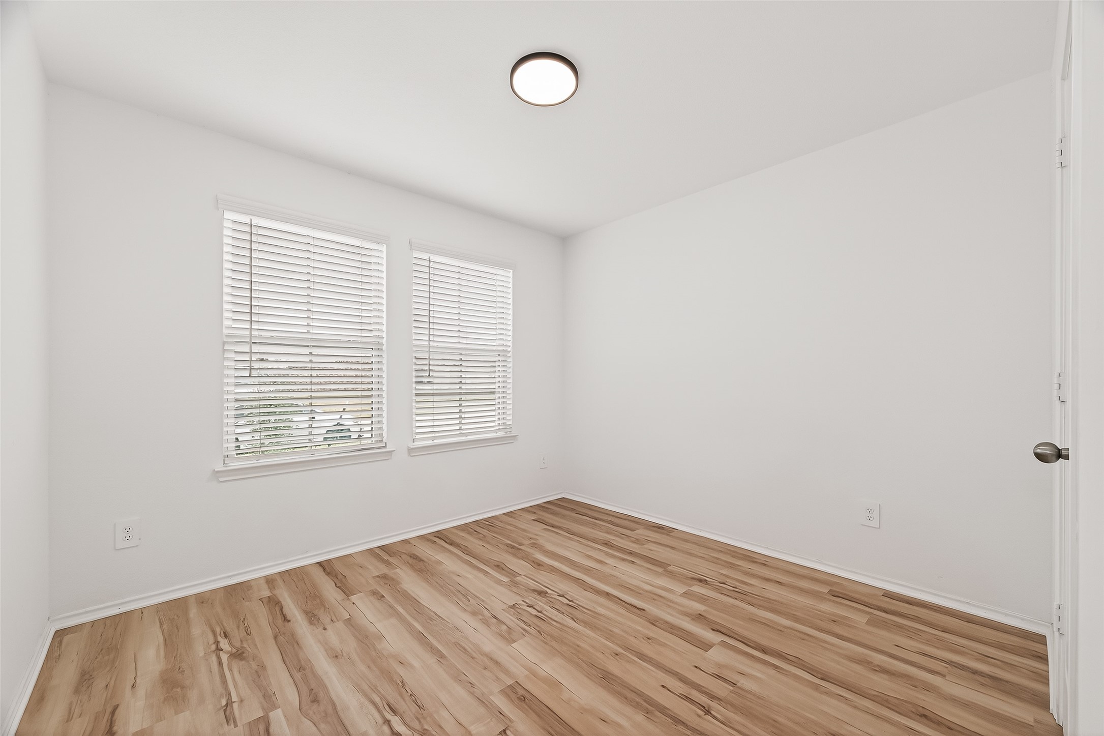 21522 Violet Ridge Road Katy, TX 77449 - Photo 23 of 39 Beautiful bedroom 3 off the private hall from the kitchen. Perfect for a more private guest bedroom or office.