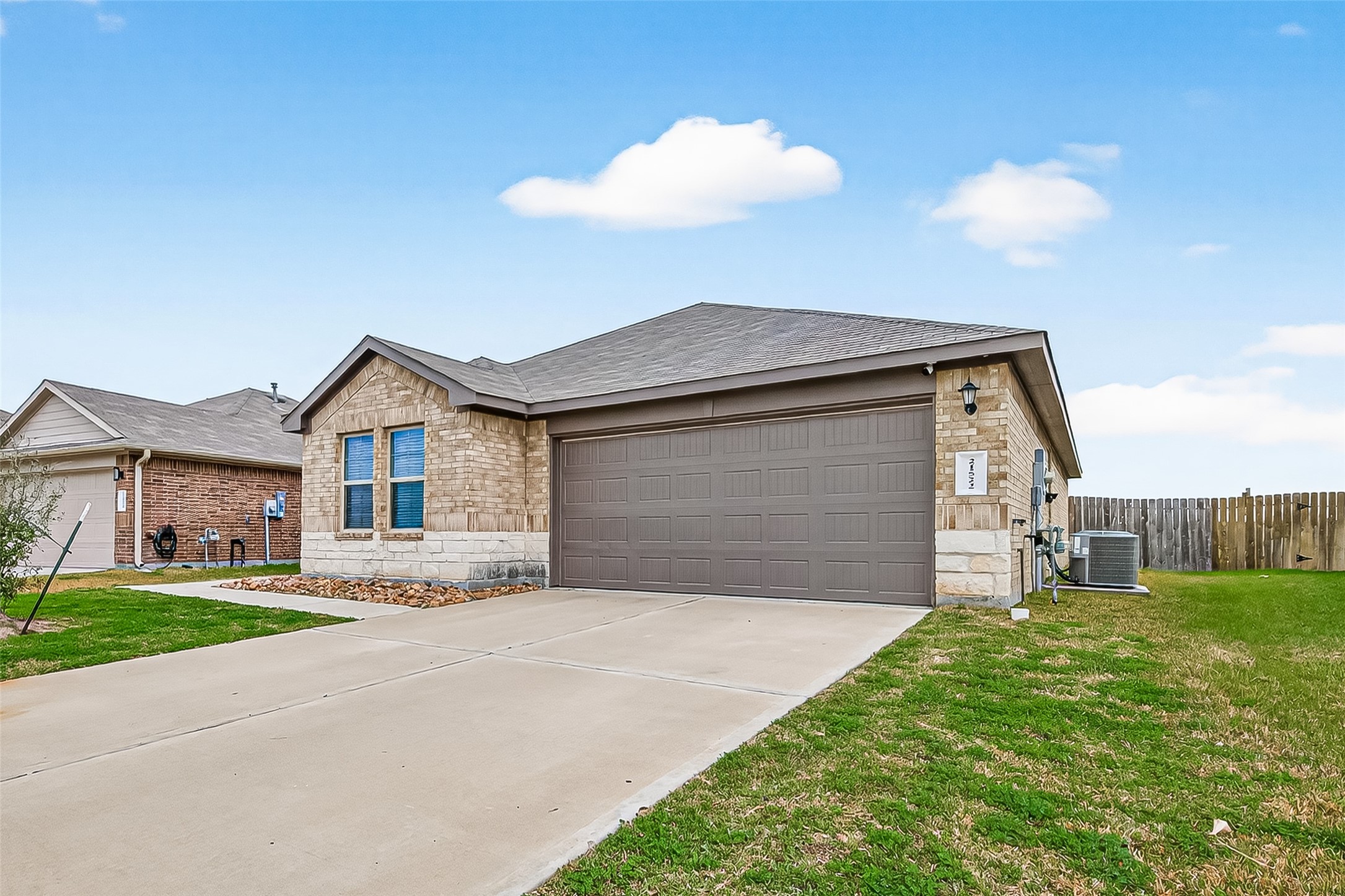 21522 Violet Ridge Road Katy, TX 77449 - Photo 3 of 39 A spacious driveway, perfect for a basketball goal and creating lasting memories.