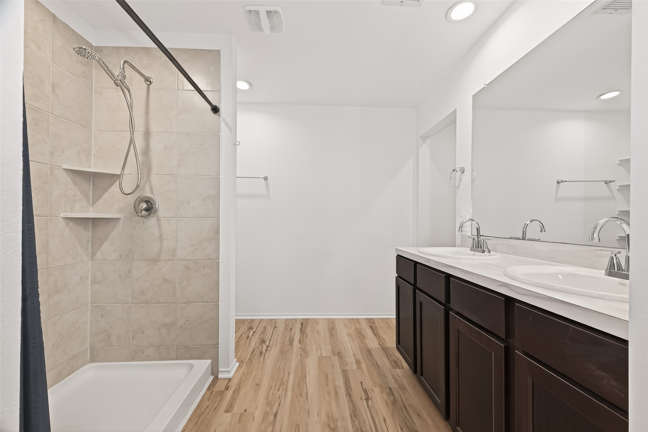 21522 Violet Ridge Road Katy, TX 77449 - Photo 31 of 39 Dual sinks, NEW modern faucets, New flooring, and OVERSIZED adult-sized shower!