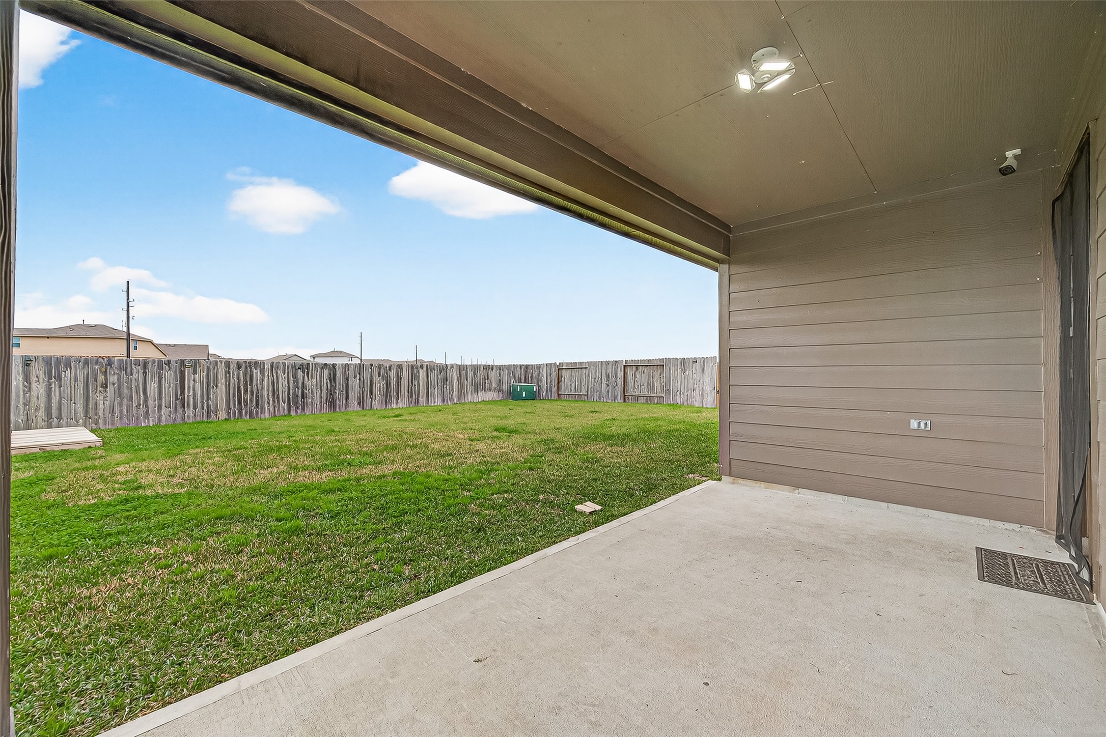21522 Violet Ridge Road Katy, TX 77449 - Photo 36 of 39 The perfect wall to keep your outdoor TV protected from the rain!