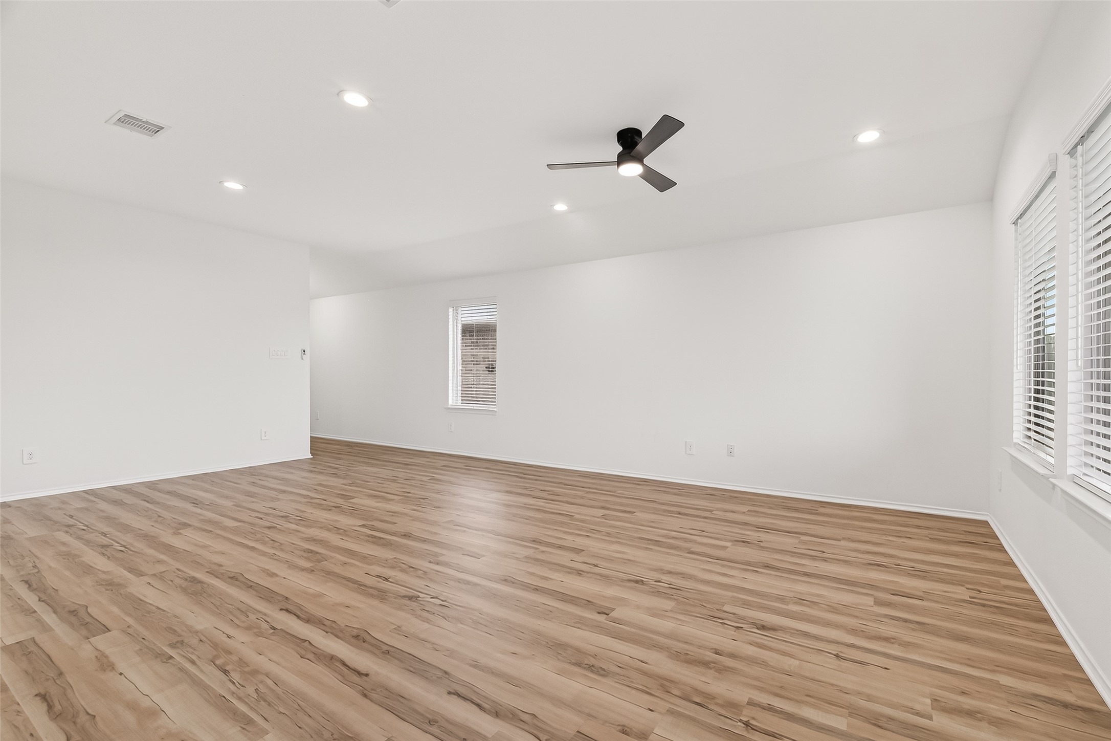 21522 Violet Ridge Road Katy, TX 77449 - Photo 9 of 39 Ample wall space for art enthusiasts and a GAME DAY size screen!!