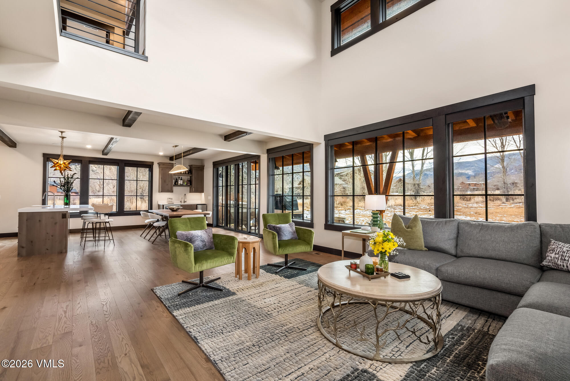 580 Hunters View Lane Eagle, CO 81631 - Photo 1 of 33 a living room with furniture and a large window