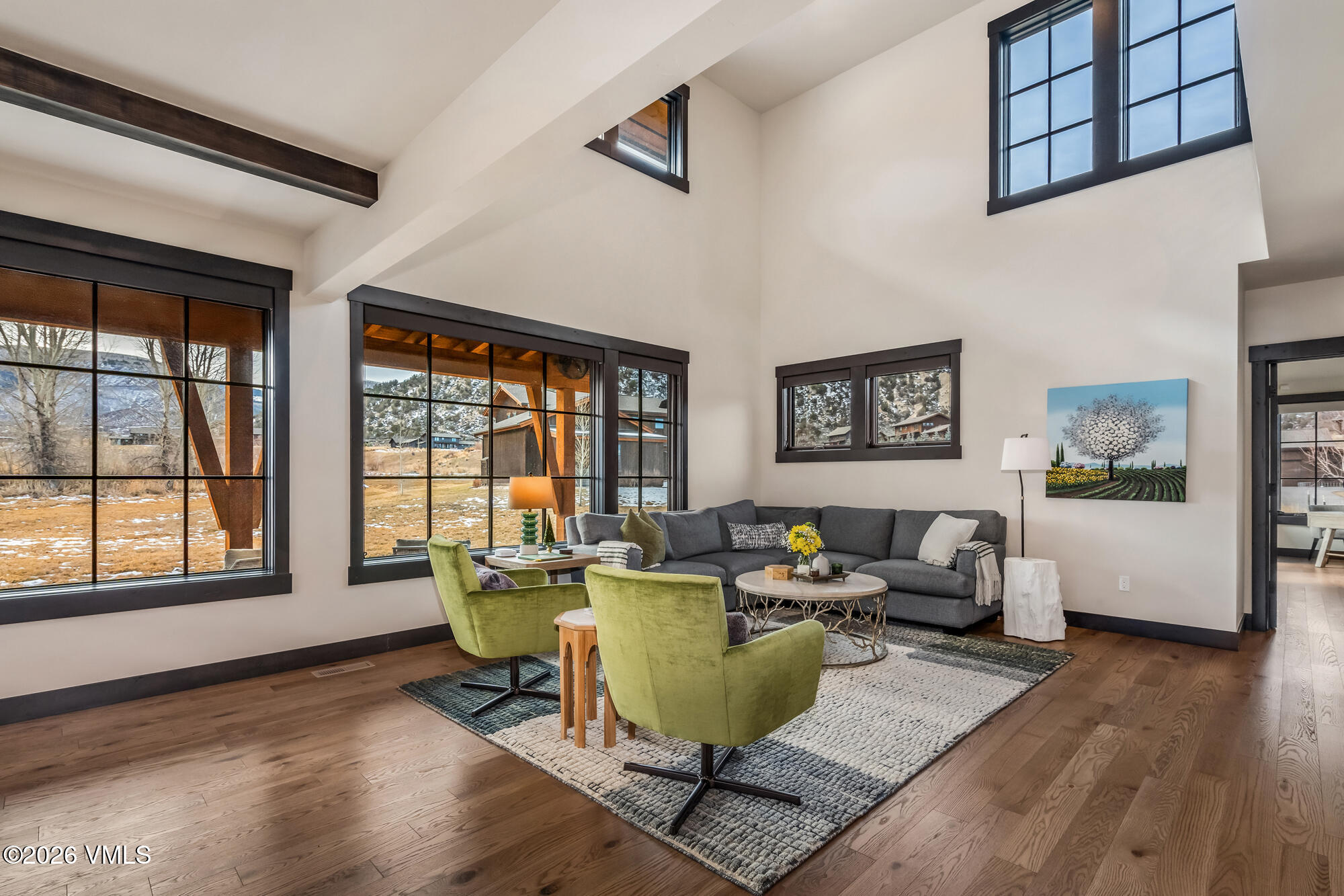 580 Hunters View Lane Eagle, CO 81631 - Photo 14 of 33 a living room with furniture and a large window