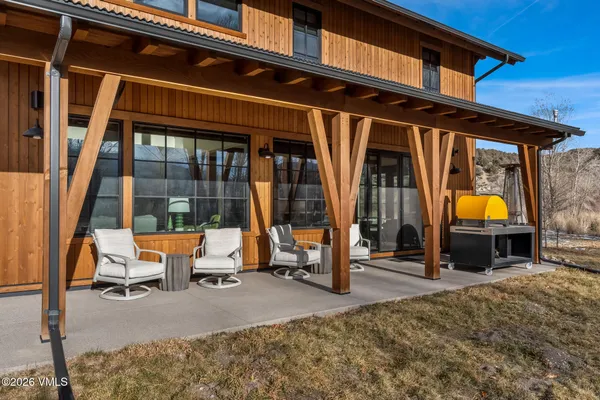 a view of a lounge chairs in the patio