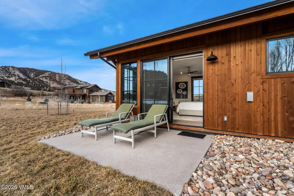 a building outdoor space with patio furniture