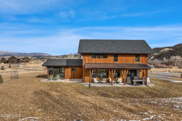 a view of a cafe with sitting area