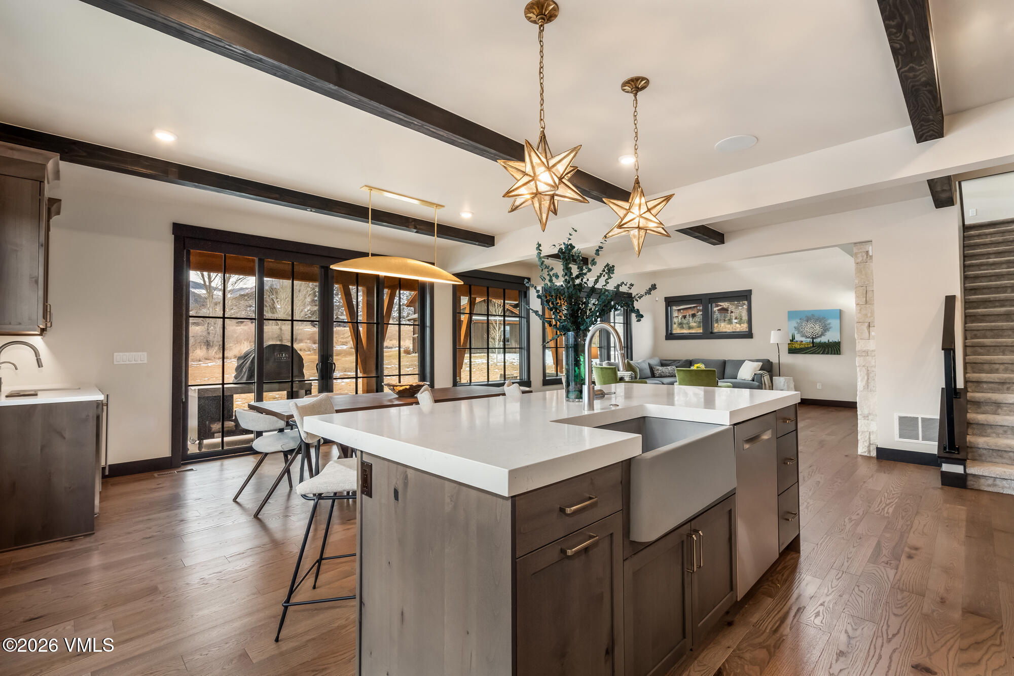 580 Hunters View Lane Eagle, CO 81631 - Photo 8 of 33 a large kitchen with a table and chairs