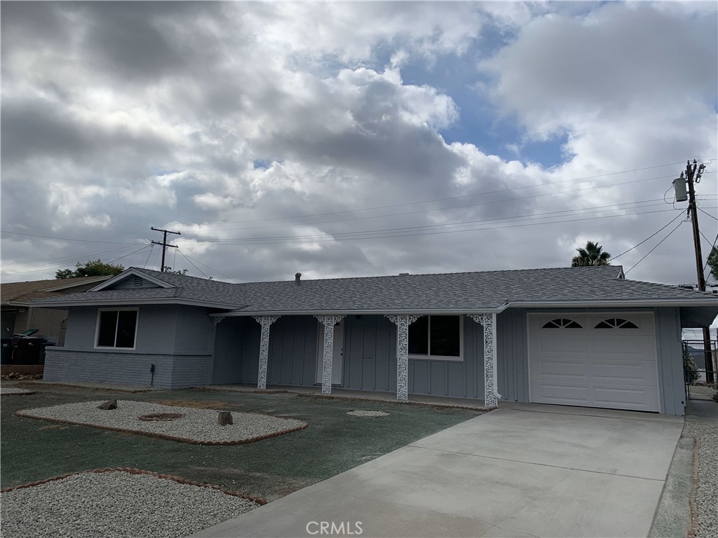 27335 El Rancho Road Sun City, CA 92586 - Photo 1 of 1 a front view of a house with a garage