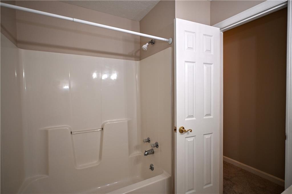 124 Valleycrest Drive Cecil, PA 15321 - Photo 14 of 38 a bathroom with a glass shower door