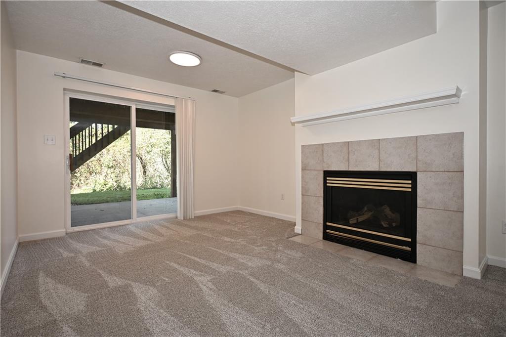124 Valleycrest Drive Cecil, PA 15321 - Photo 24 of 38 a view of empty room with a fireplace