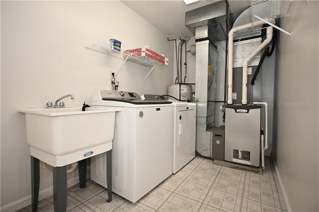 124 Valleycrest Drive Cecil, PA 15321 - Photo 27 of 38 a utility room with dryer and washer