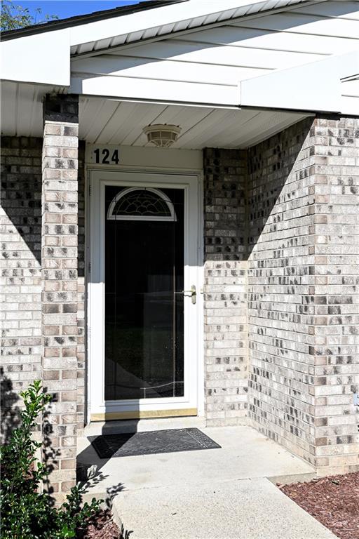 124 Valleycrest Drive Cecil, PA 15321 - Photo 3 of 38 a stone house with a outdoor space