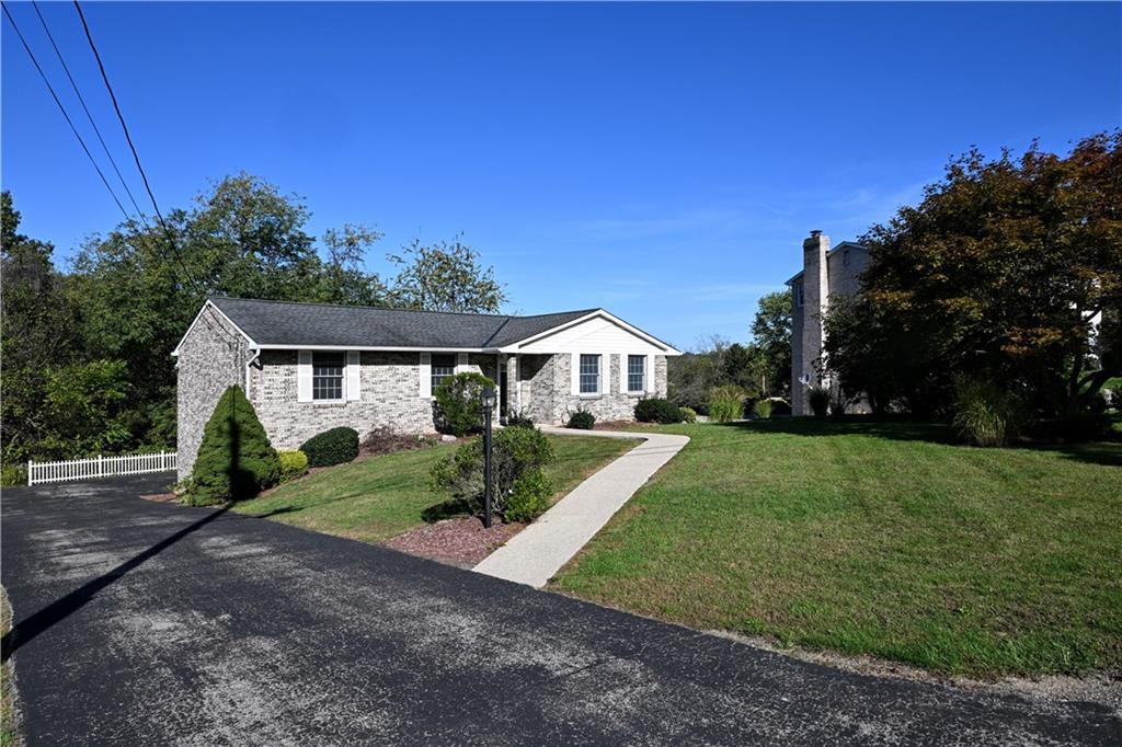 124 Valleycrest Drive Cecil, PA 15321 - Photo 32 of 38 a front view of a house with a yard