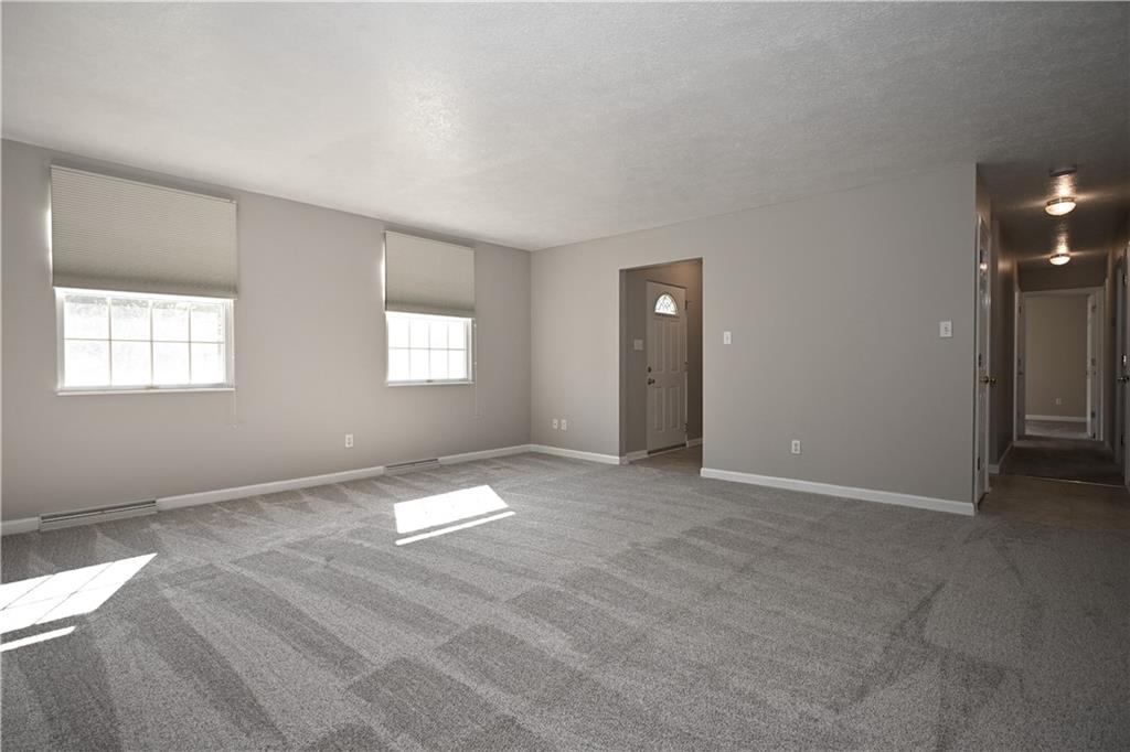 124 Valleycrest Drive Cecil, PA 15321 - Photo 5 of 38 an empty room with windows