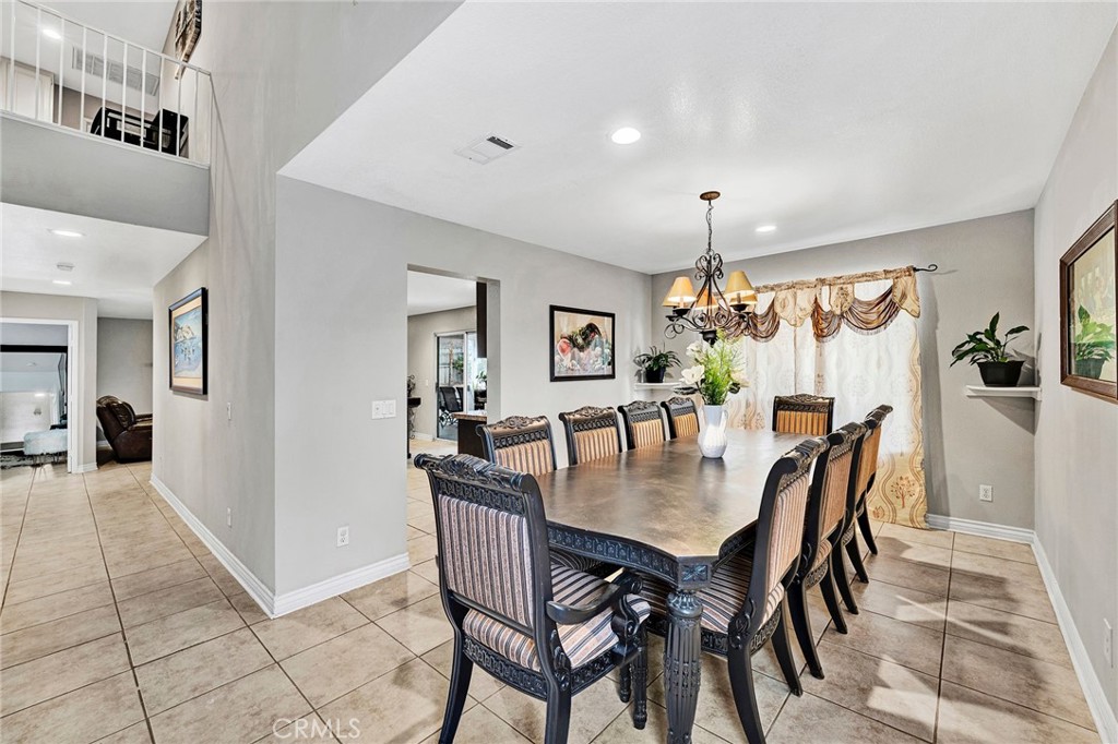 31755 Ridgeview Drive Lake Elsinore, CA 92532 - Photo 11 of 36 a dining room with furniture and window