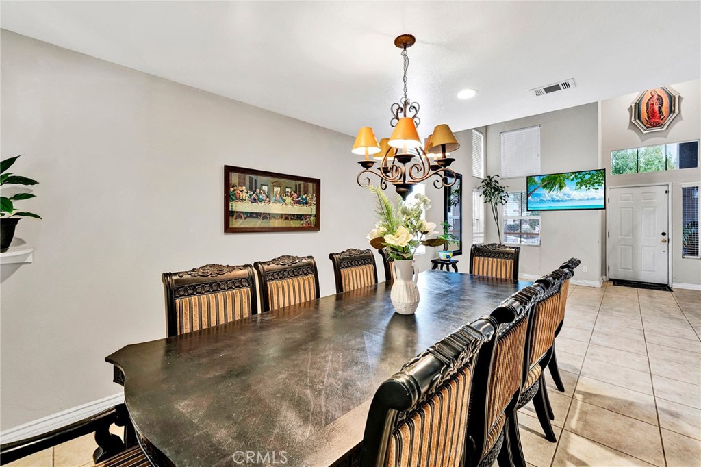 31755 Ridgeview Drive Lake Elsinore, CA 92532 - Photo 14 of 36 a dining room with furniture and window