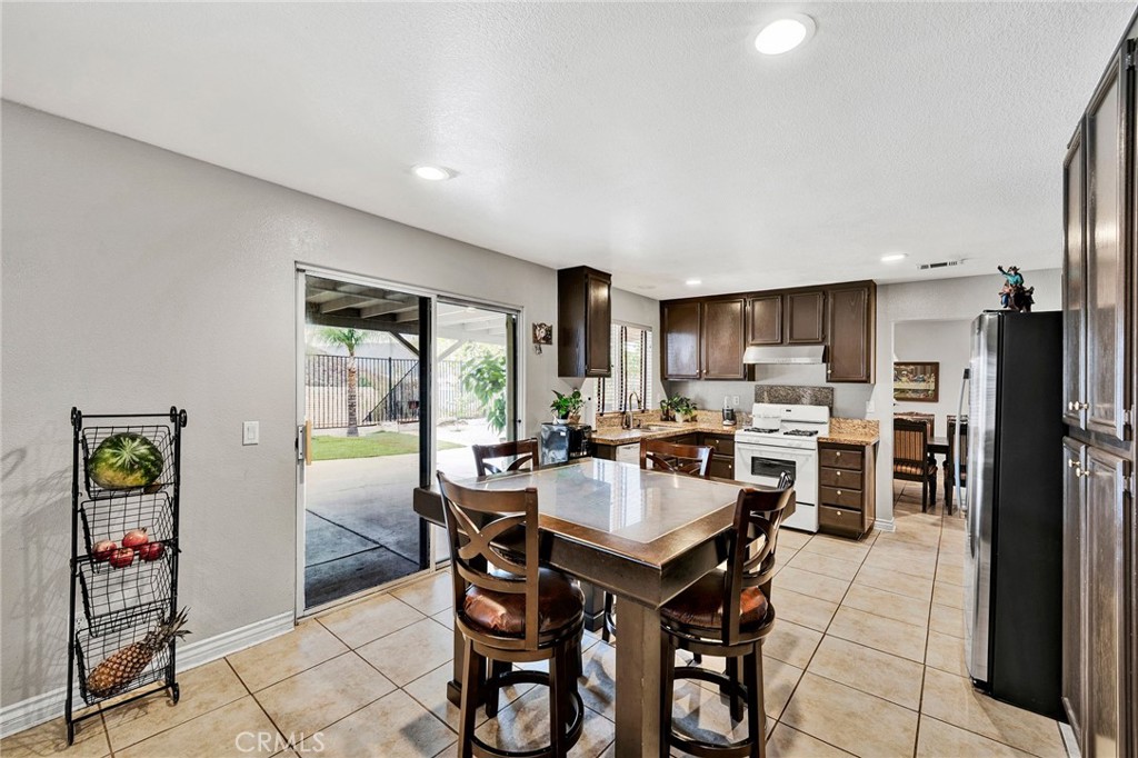 31755 Ridgeview Drive Lake Elsinore, CA 92532 - Photo 19 of 36 a view of a dining room kitchen and a window