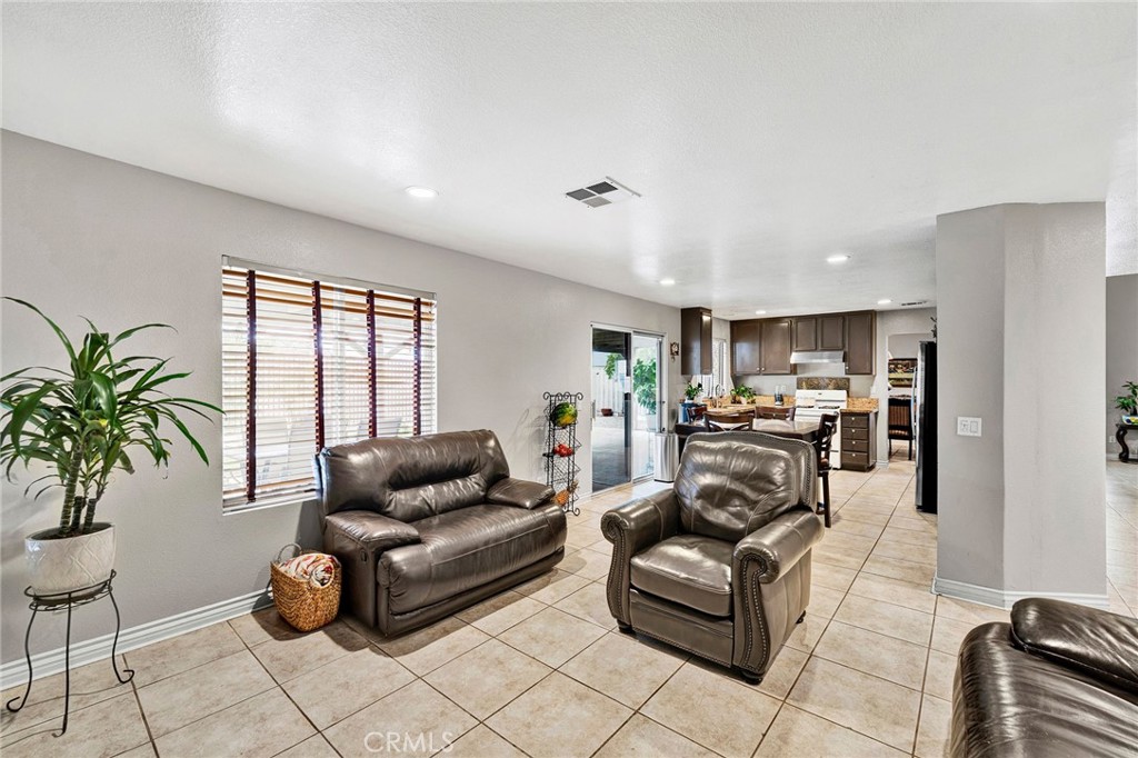 31755 Ridgeview Drive Lake Elsinore, CA 92532 - Photo 23 of 36 a living room with furniture and a large window