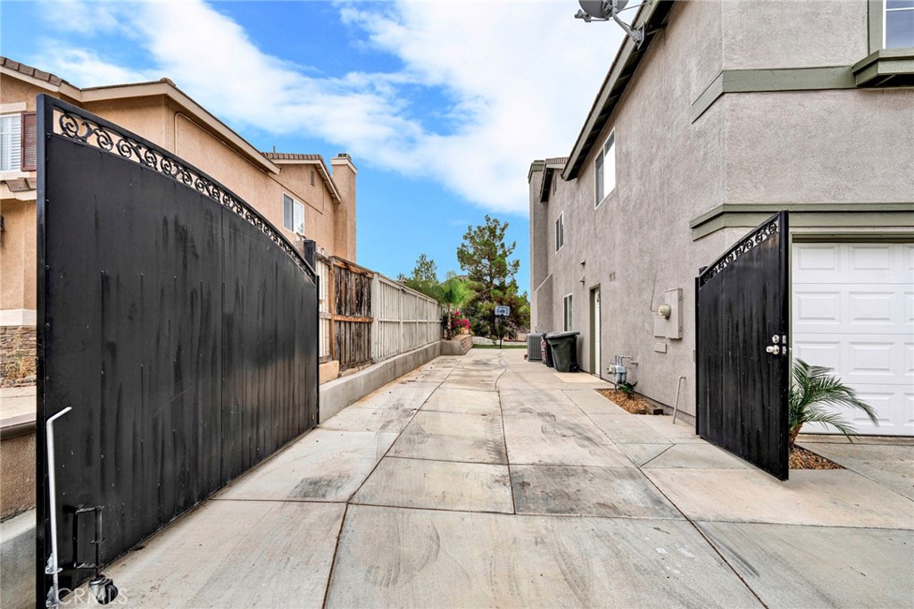 31755 Ridgeview Drive Lake Elsinore, CA 92532 - Photo 3 of 36 a view of a pathway along the side of a street