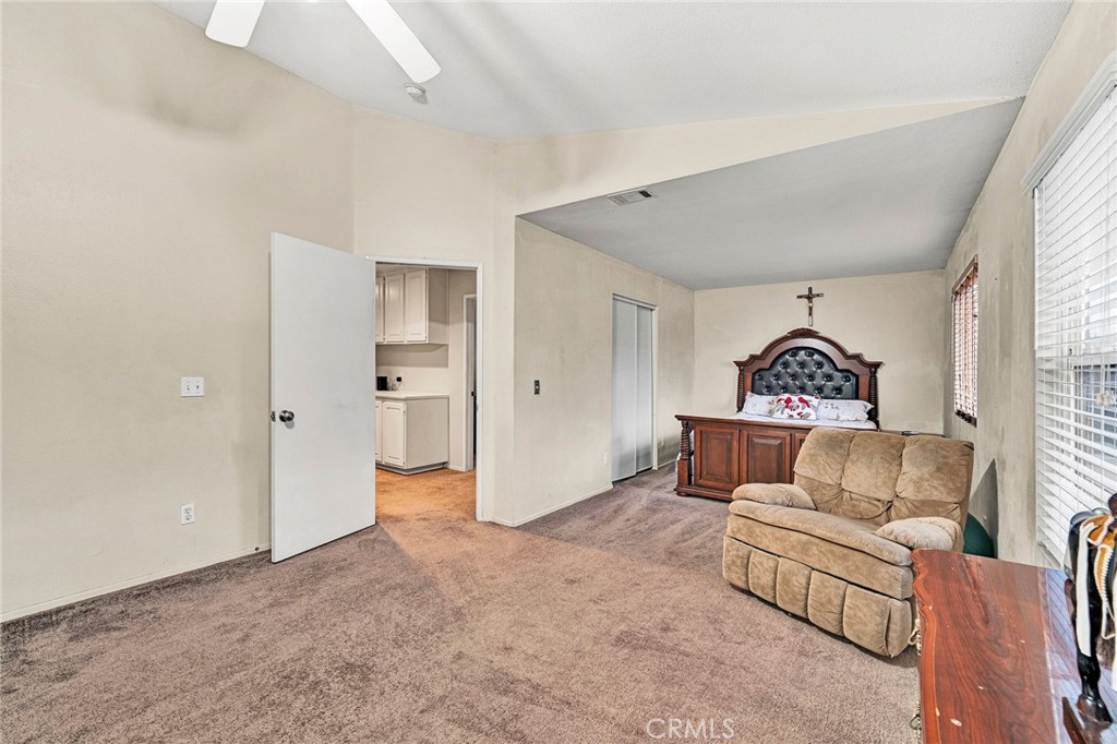 31755 Ridgeview Drive Lake Elsinore, CA 92532 - Photo 35 of 36 a bedroom with furniture and a window