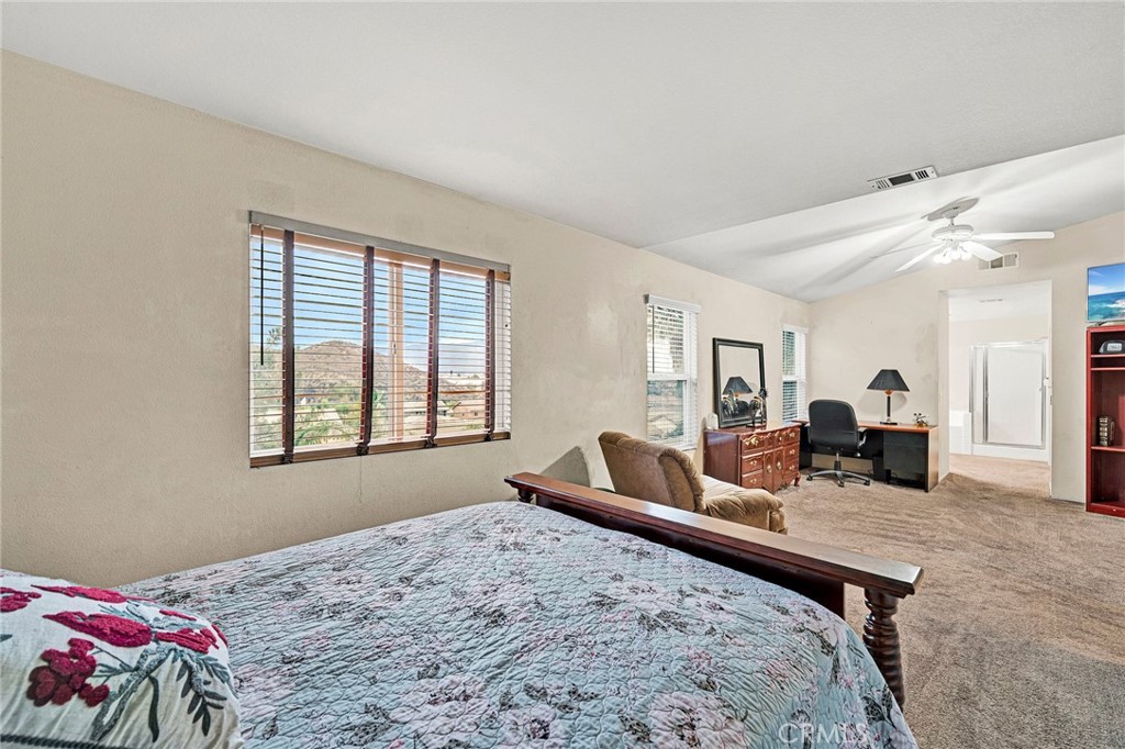 31755 Ridgeview Drive Lake Elsinore, CA 92532 - Photo 36 of 36 a living room with furniture and a table