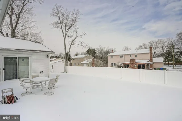 a view of a terrace with snow on the road