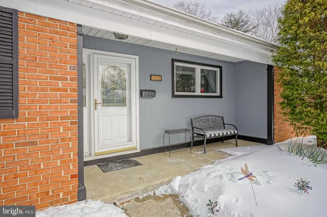 a backyard of a house with seating space