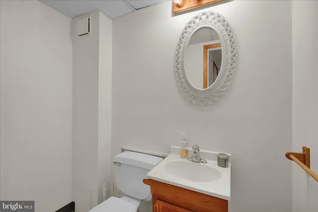 a bathroom with a toilet and a sink